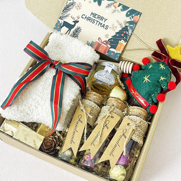 3. Christmas Tea & Cozy Gift Box – Socks, Honey, Herbal Tea, Chocolates & Ornament