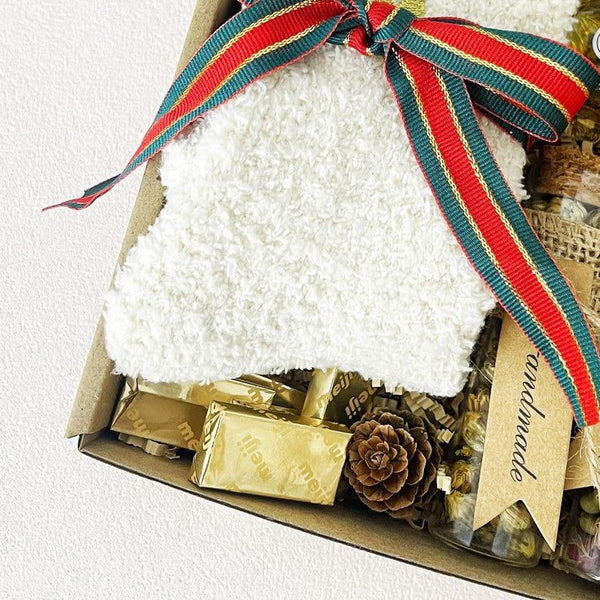 3. Christmas Tea & Cozy Gift Box – Socks, Honey, Herbal Tea, Chocolates & Ornament